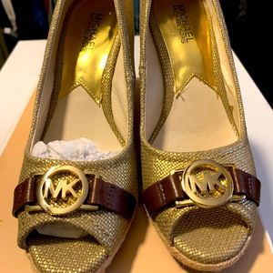 Beautiful pair of canvas wedge shoes.